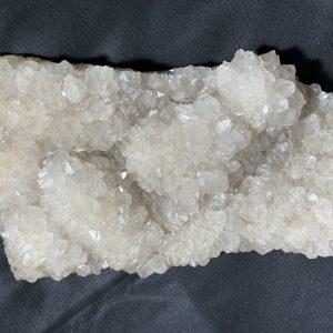 Cristal de Roche avec pseudomorphose de Baryte et Fluorine